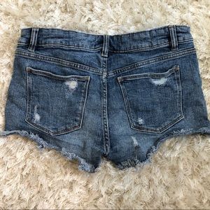 Zara medium wash distressed jean shorts